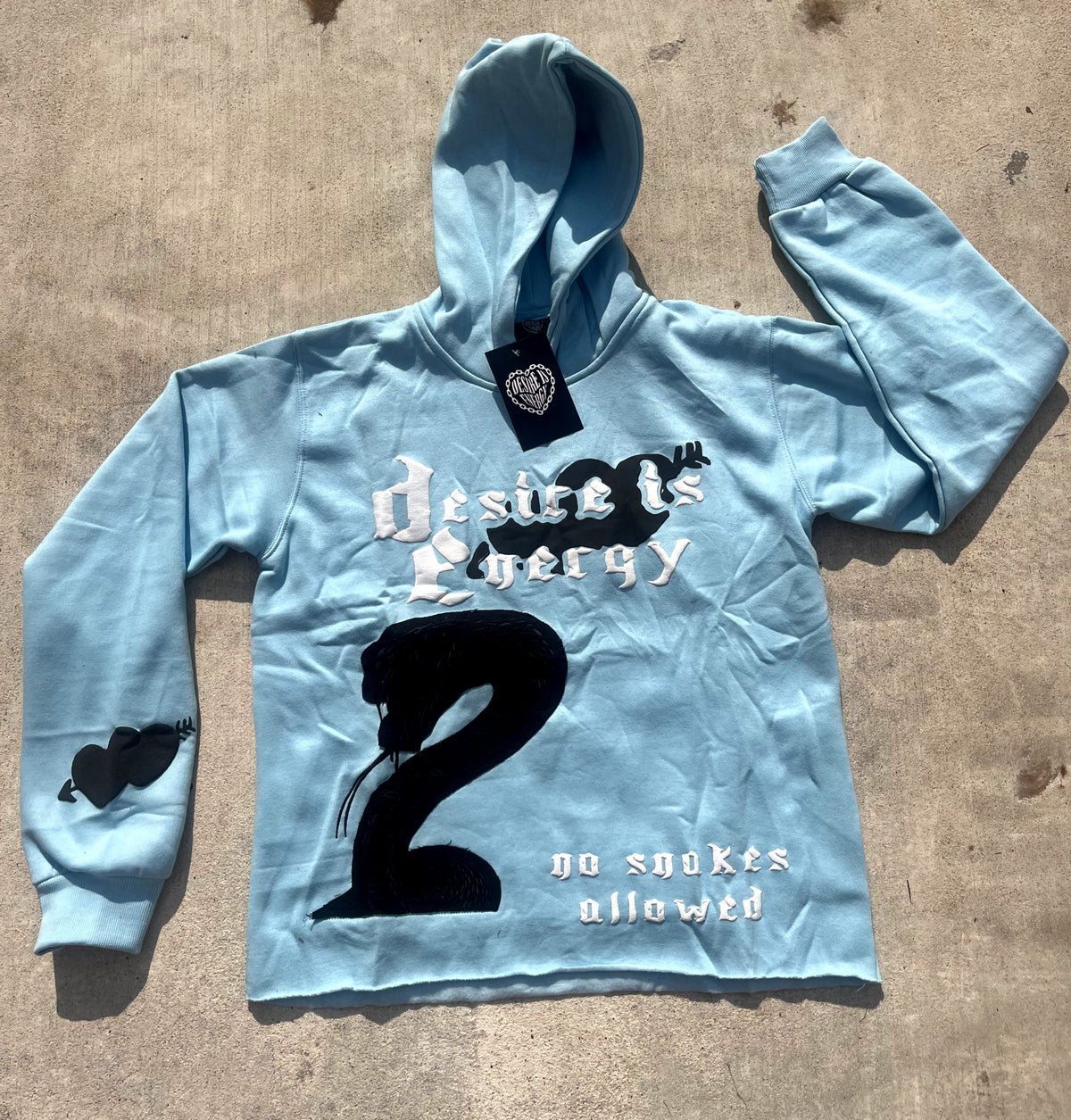 “No Snakes Allowed” - Baby Blue Cropped Hoodie